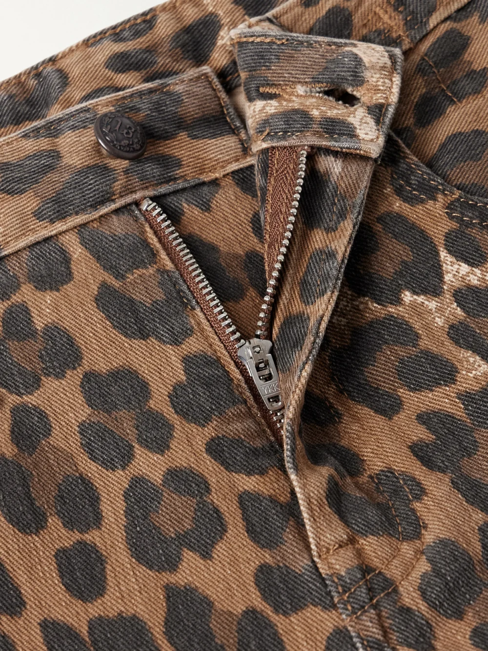Close-up detail of the R13 Kick Fit Cropped Leopard-print Mid-rise Flared Jeans