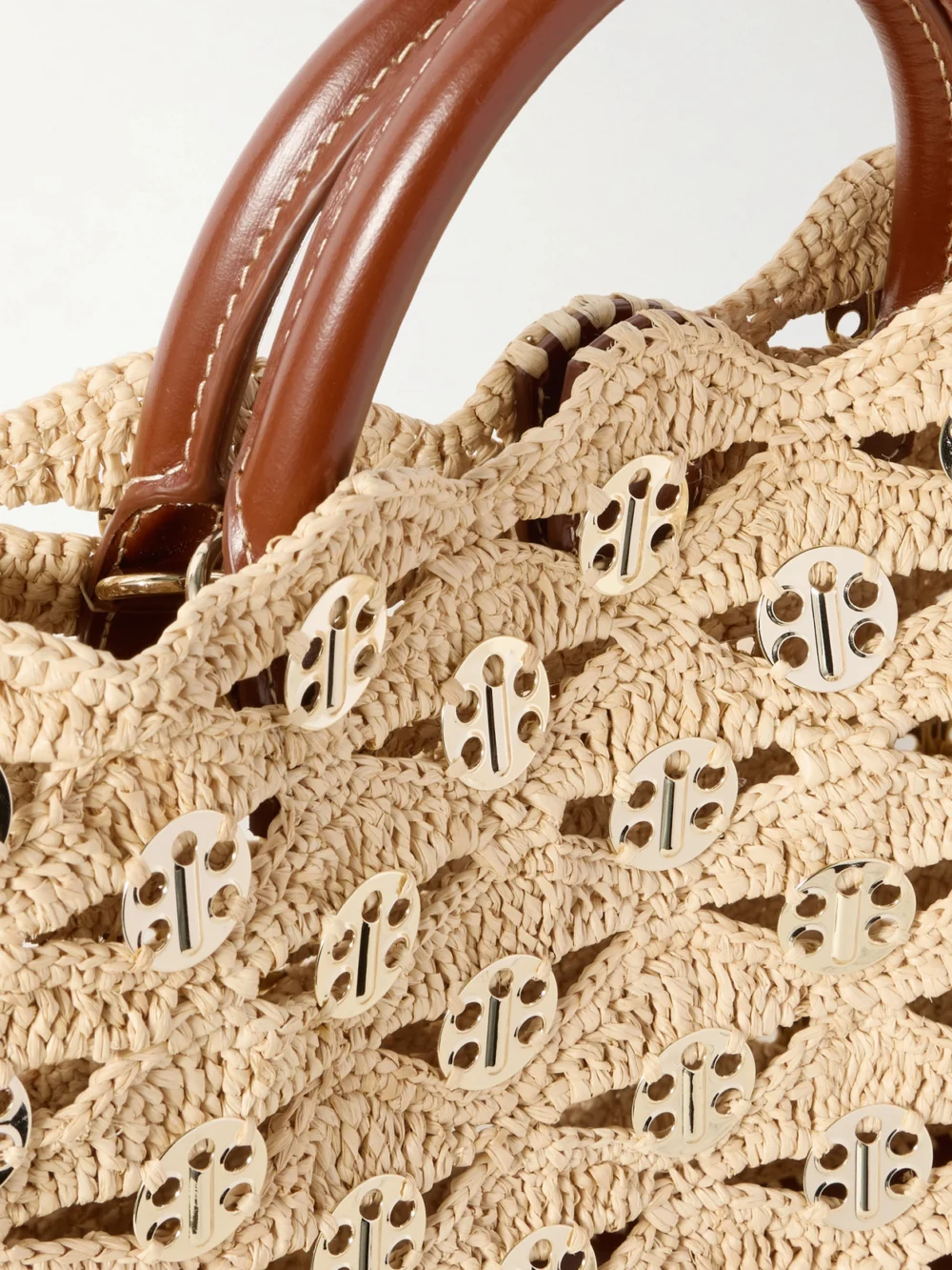 Close-up detail of the Rabanne 1969 Leather-trimmed Chainmail-embellished Raffia Tote