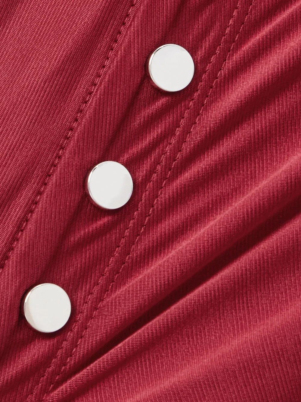 Close-up detail of the Rabanne Button-detailed Gathered Jersey Midi Dress