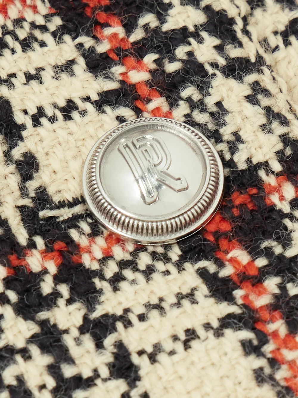 Close-up detail of the Rabanne Checked Wool-blend Tweed Midi Skirt
