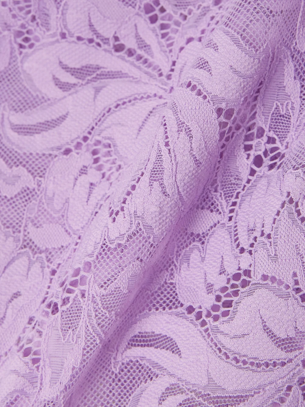 Close-up detail of the Rabanne Cropped Guipure Lace Top