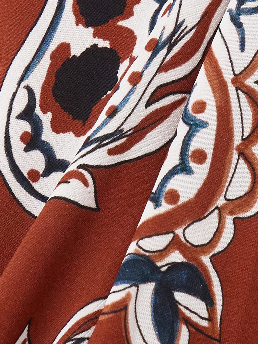 Close-up detail of the Rabanne Cropped Paisley-print Stretch-crepe Top