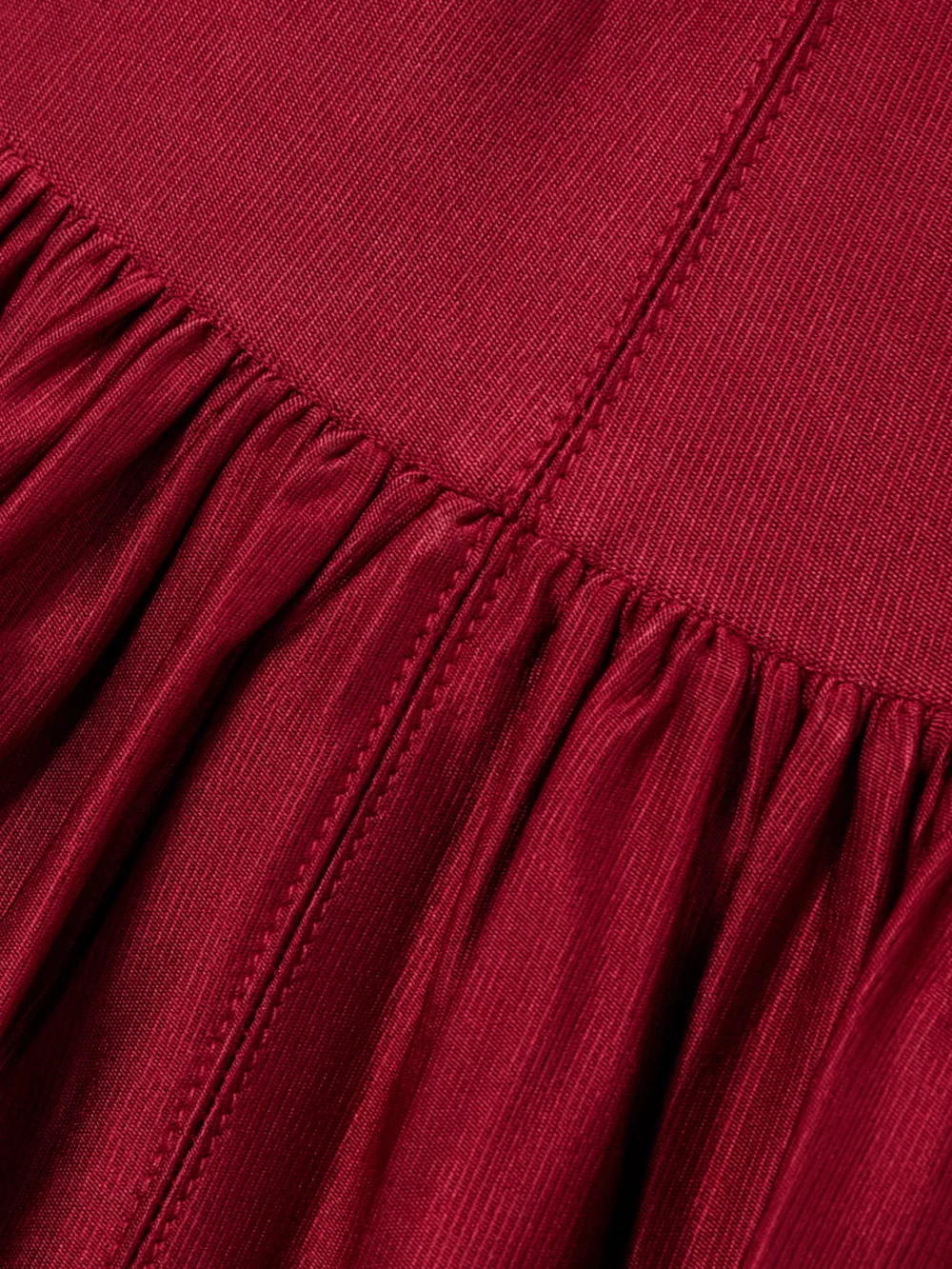 Close-up detail of the Rabanne Embellished Gathered Stretch-jersey Maxi Dress
