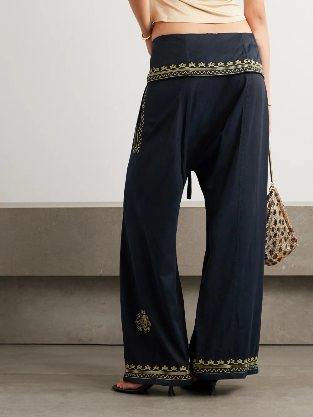 Back view of the Rabanne Embroidered Belted Layered Twill Pants