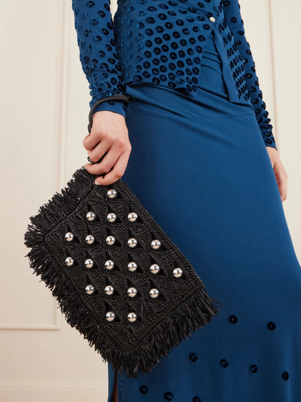 Rabanne Fringed Studded Raffia Clutch, styled view