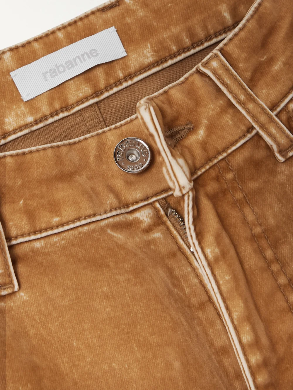 Close-up detail of the Rabanne High-rise Flared Jeans
