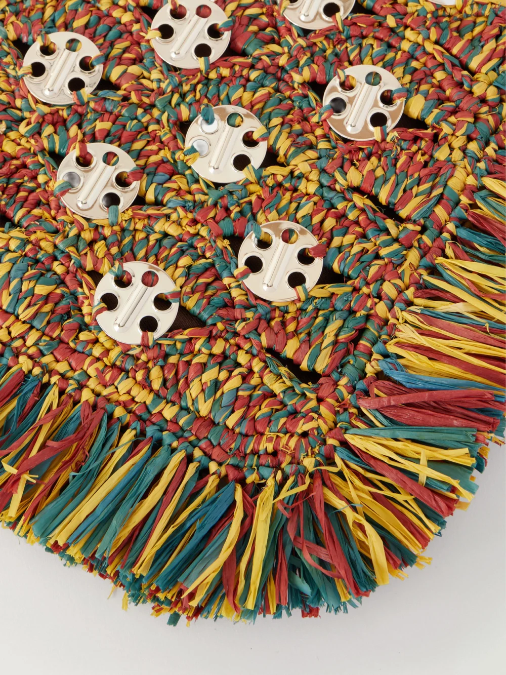 Close-up detail of the Rabanne Leather-trimmed Fringed Woven Raffia Clutch
