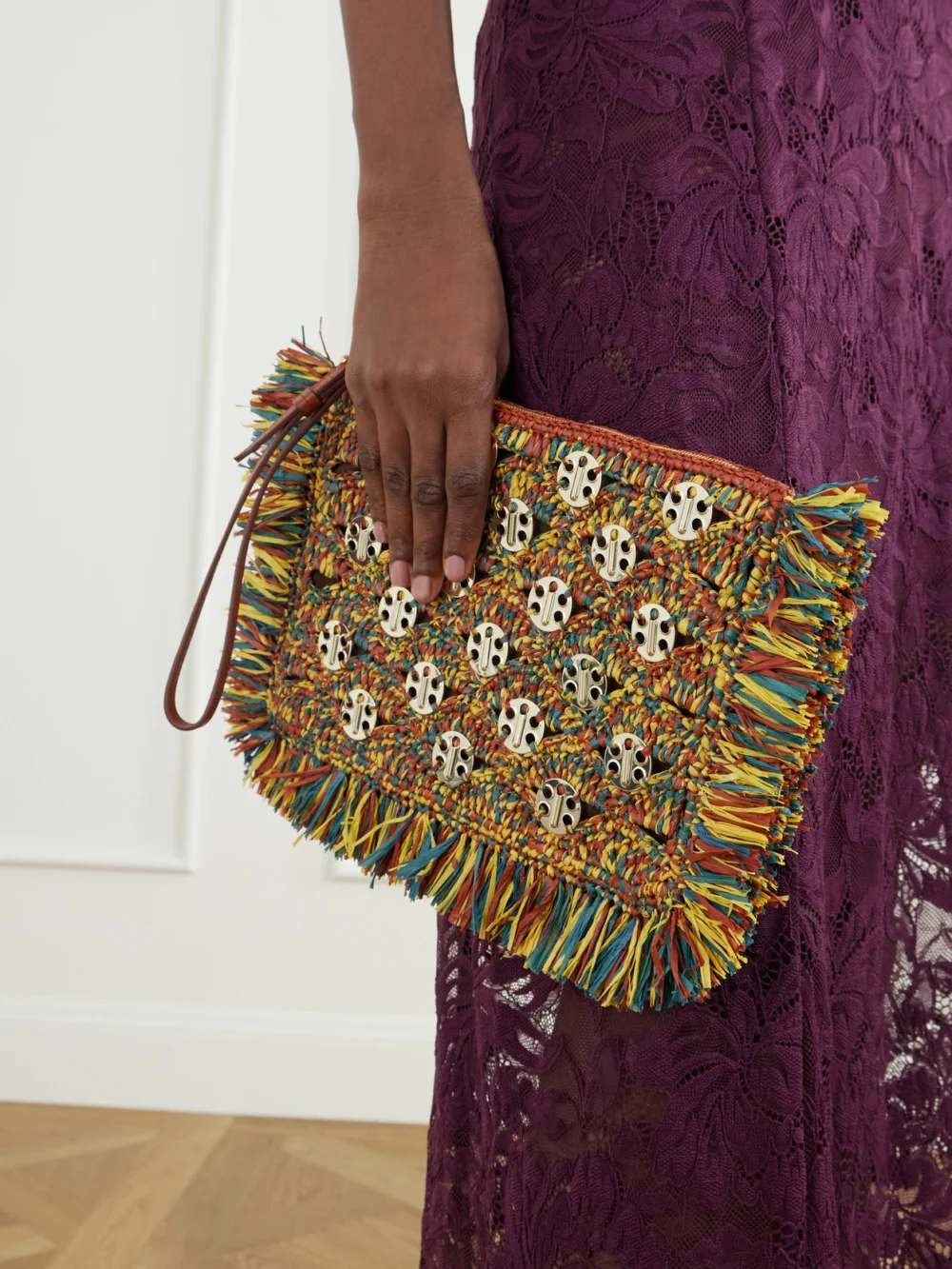 Rabanne Leather-trimmed Fringed Woven Raffia Clutch, styled view