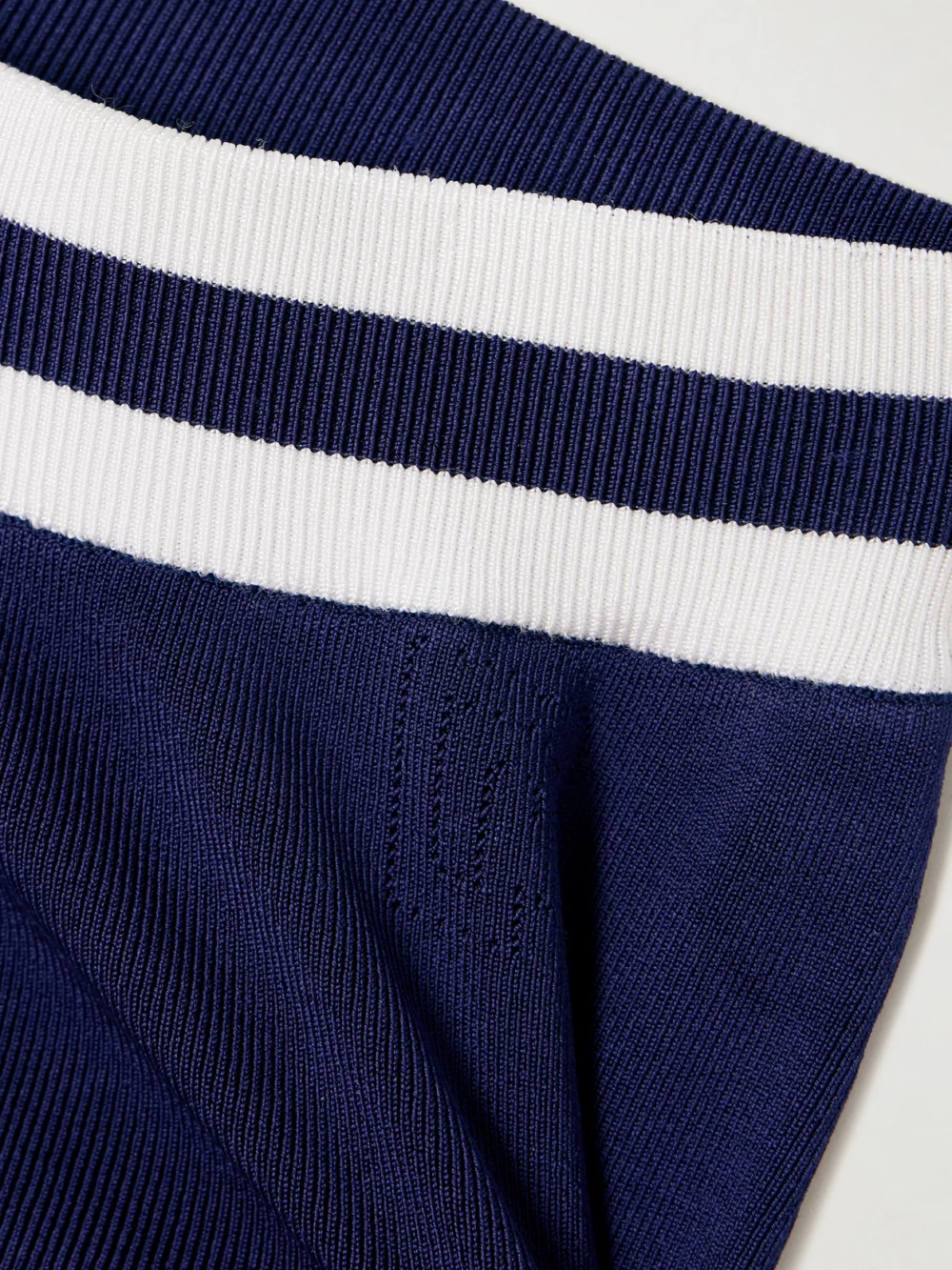 Close-up detail of the Rabanne Logo-intarsia Striped Ribbed-knit Shorts