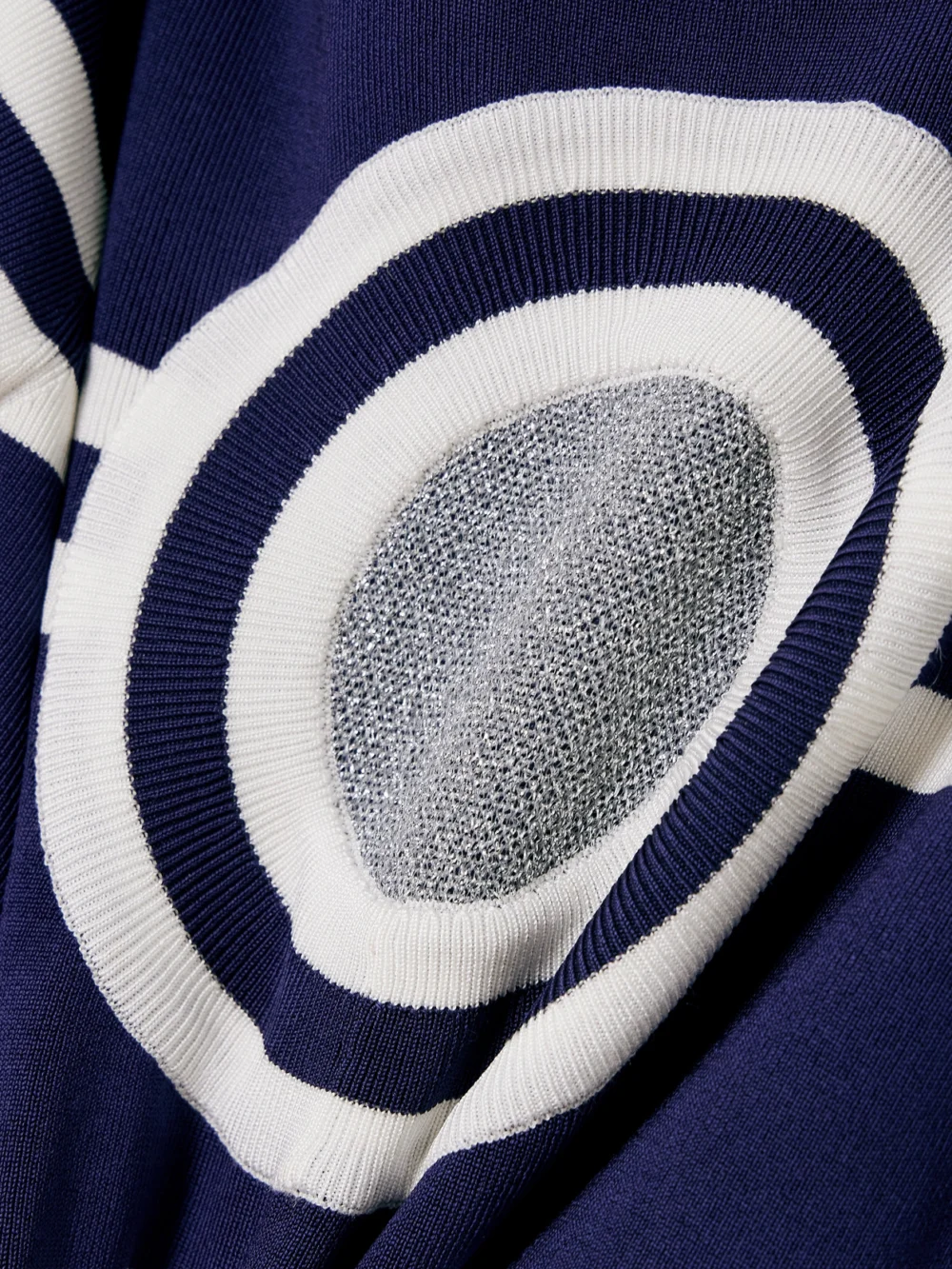 Close-up detail of the Rabanne Lurex-trimmed Striped Ribbed-knit Top