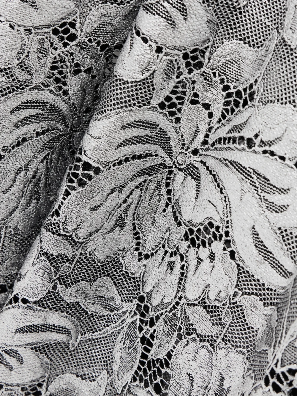 Close-up detail of the Rabanne Off-the-shoulder Metallic Stretch-lace Midi Dress
