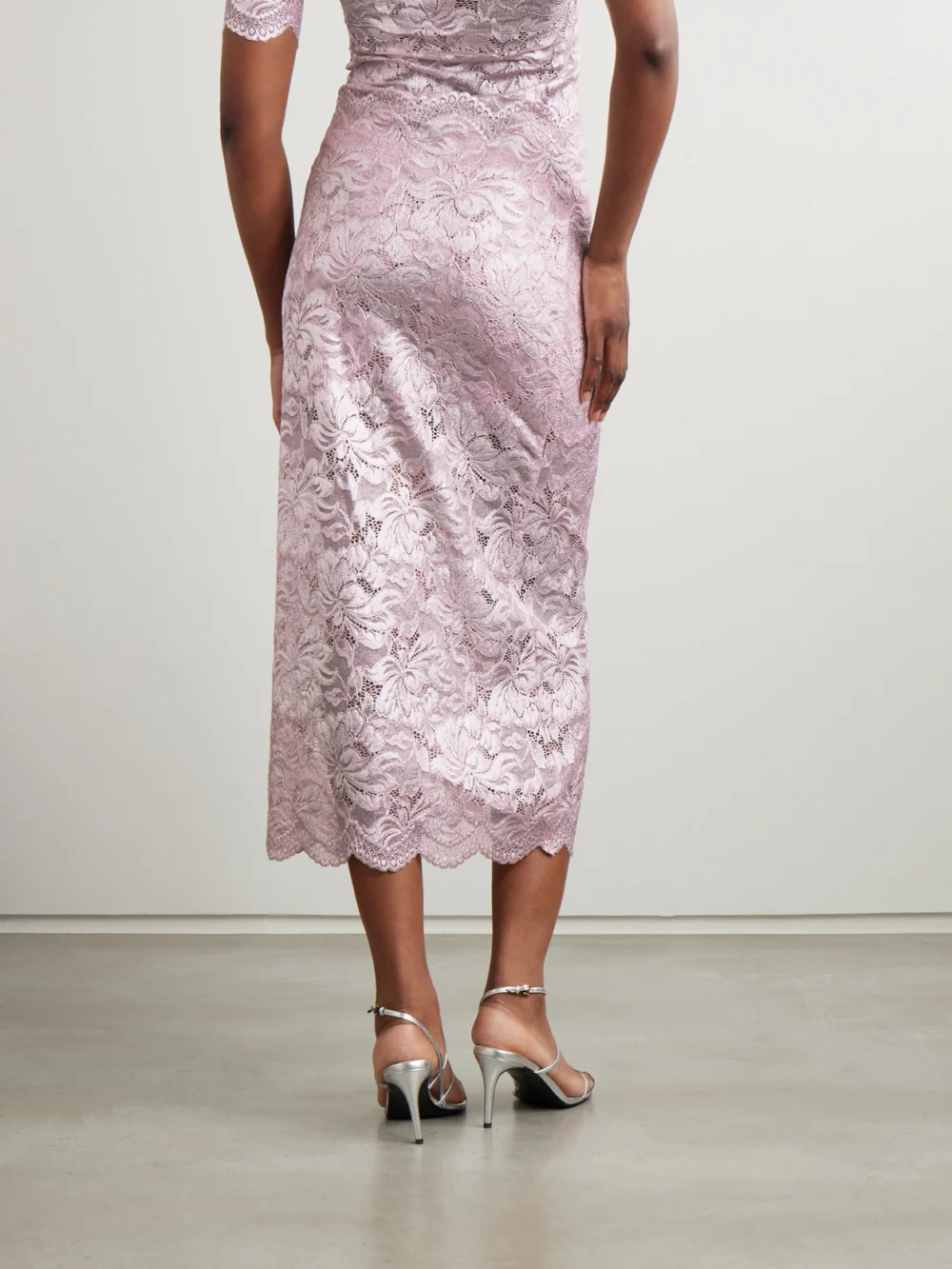 Back view of the Rabanne Scalloped Metallic Stretch-lace Midi Skirt