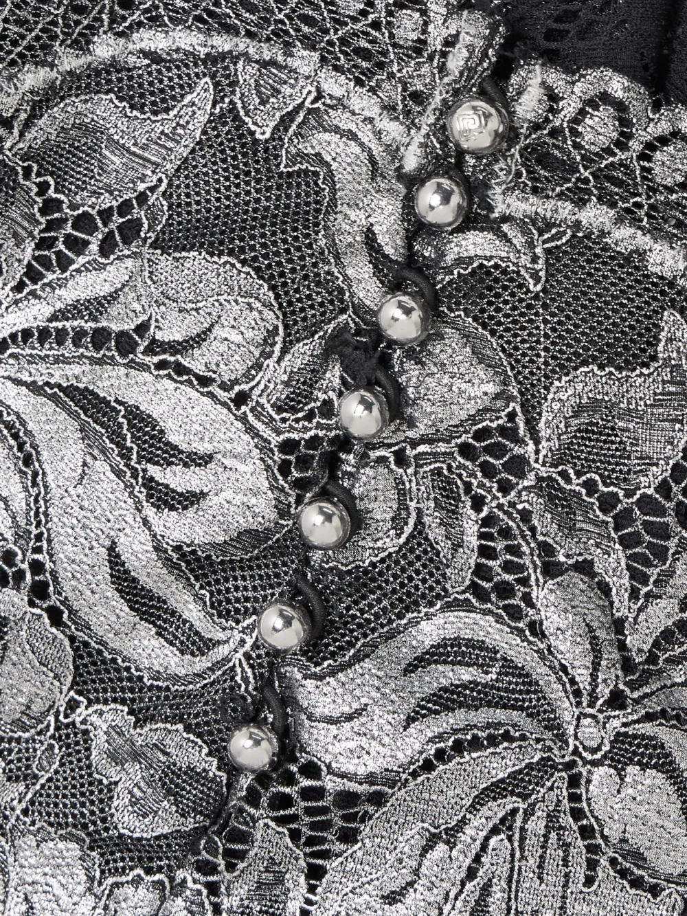 Close-up detail of the Rabanne Scalloped Metallic Stretch-lace Midi Skirt