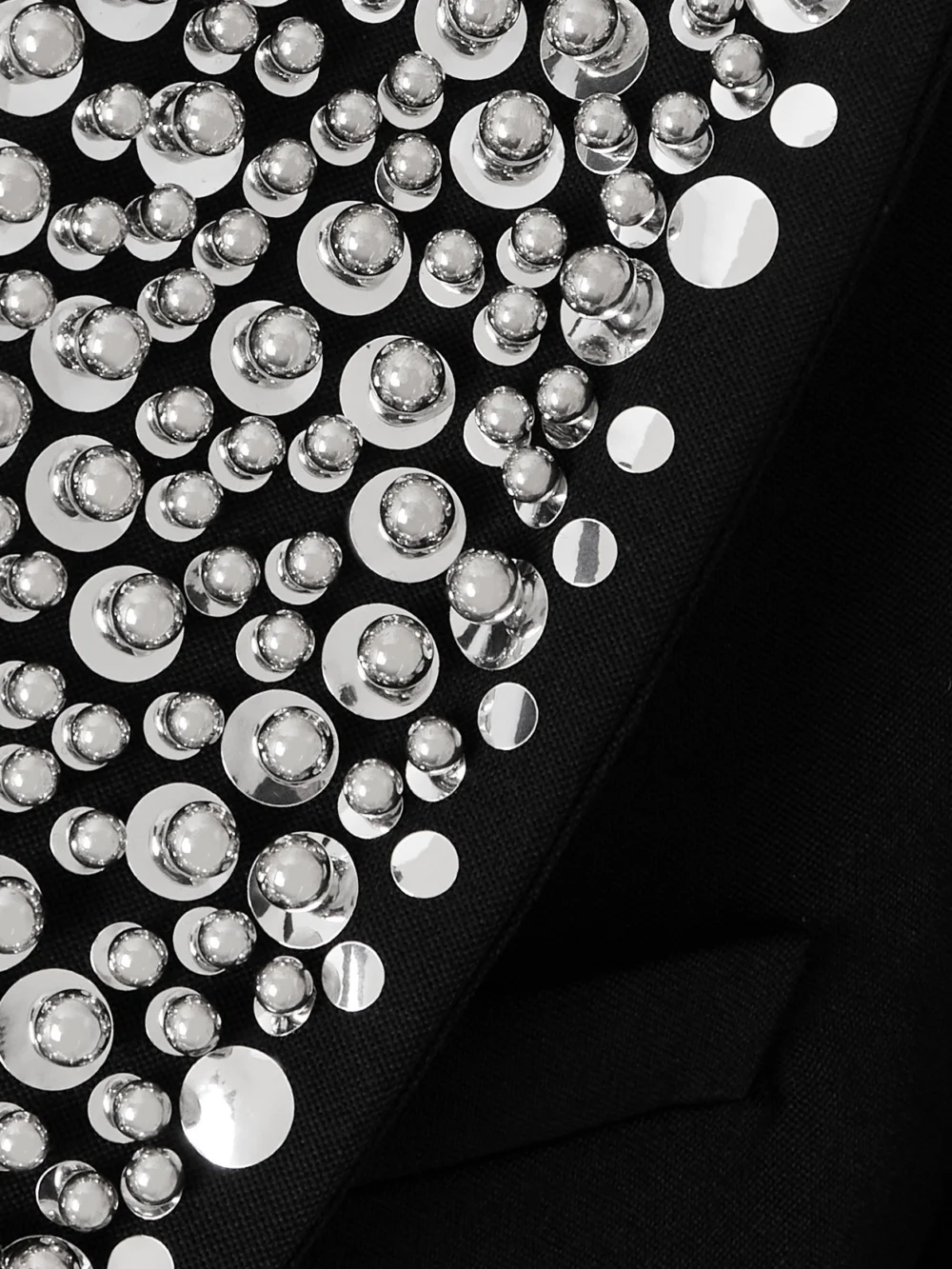 Close-up detail of the Rabanne Studded Grain De Poudre Wool Blazer
