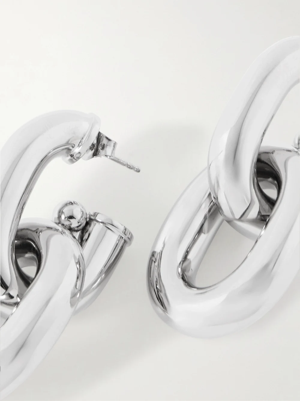Close-up detail of the Rabanne Xl Link Silver-tone Earrings