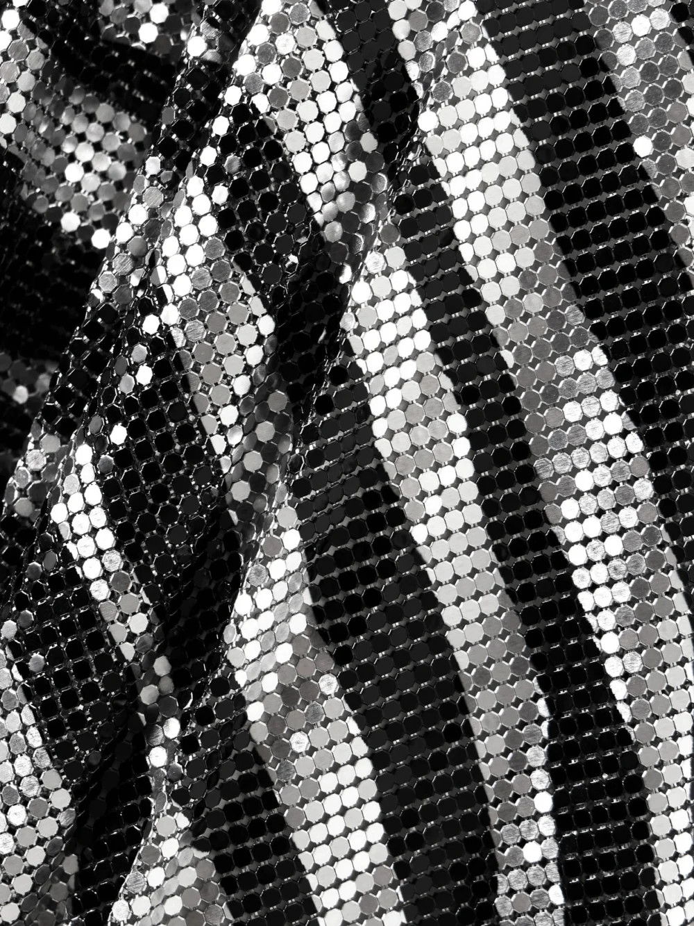 Close-up detail of the Rabanne Zebra-print Chainmail Midi Dress