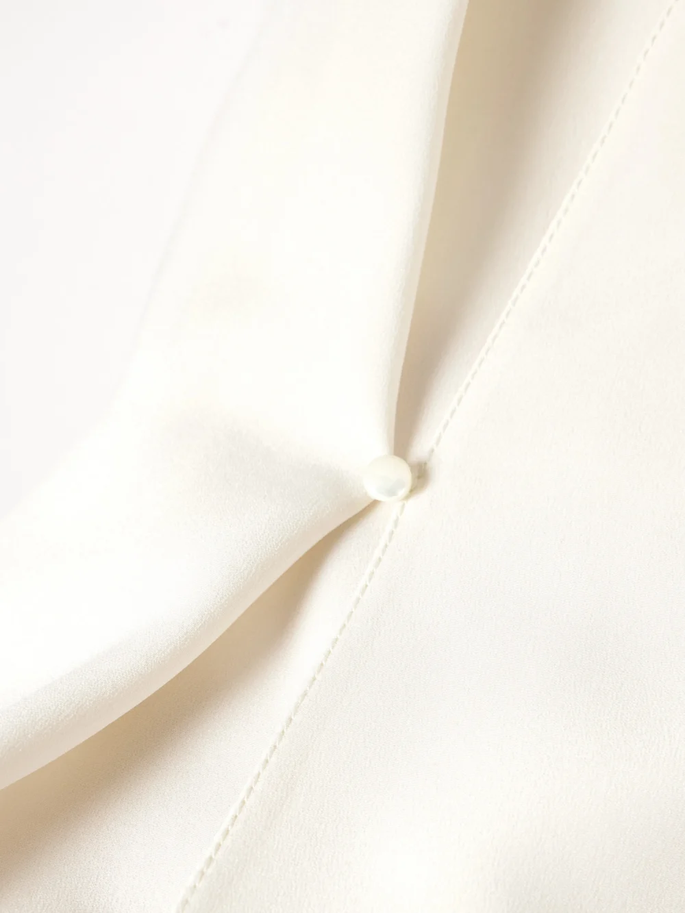 Close-up detail of the Ralph Lauren Collection Liora Wrap-effect Silk Crepe De Chine Blouse