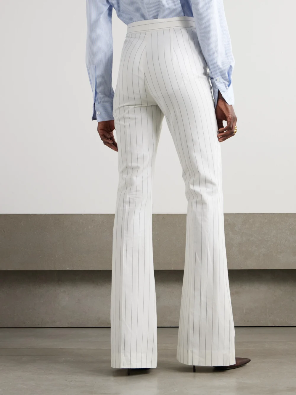 Back view of the Ralph Lauren Collection Neeva Pinstriped Cotton, Linen and Wool-blend Flared Pants