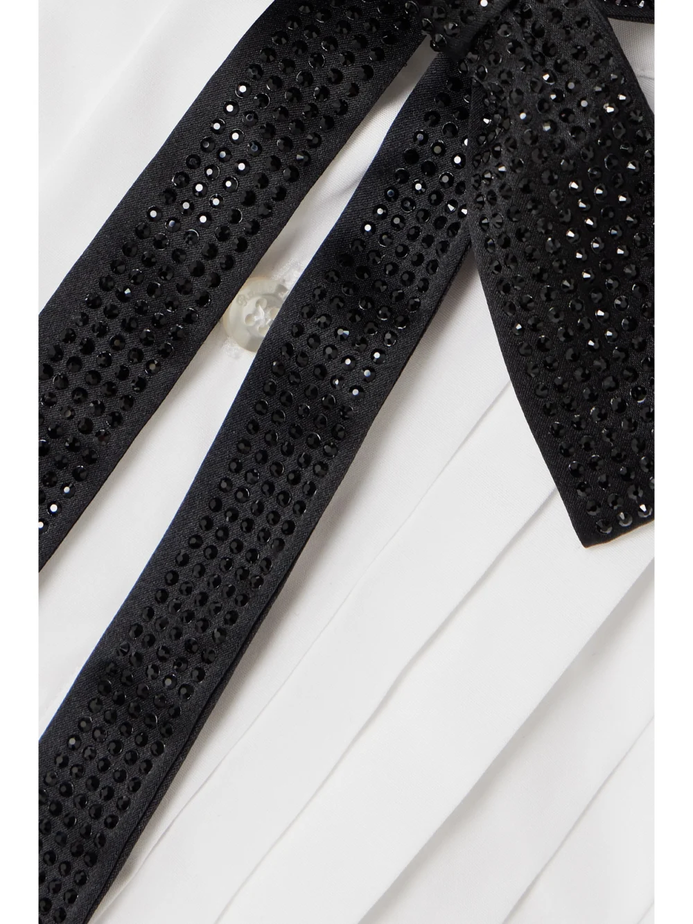 Close-up detail of the Ralph Lauren Collection Sorrento Embellished Bow-detailed Pleated Cotton-poplin Halterneck Top