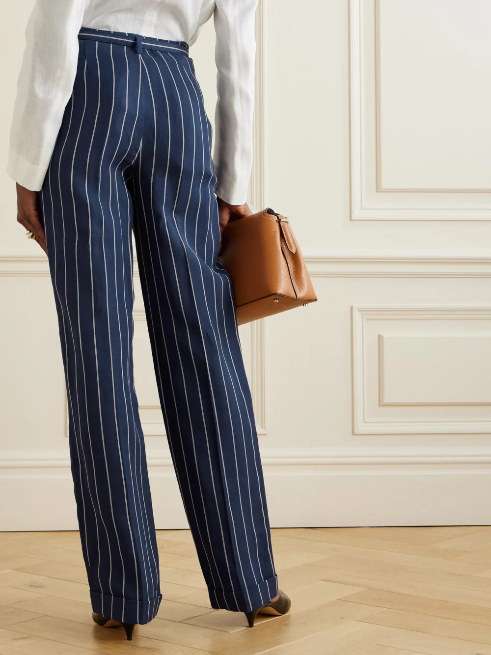 Back view of the Ralph Lauren Collection Stamford Belted Pleated Pinstriped Linen and Cotton-blend Straight-leg Pants