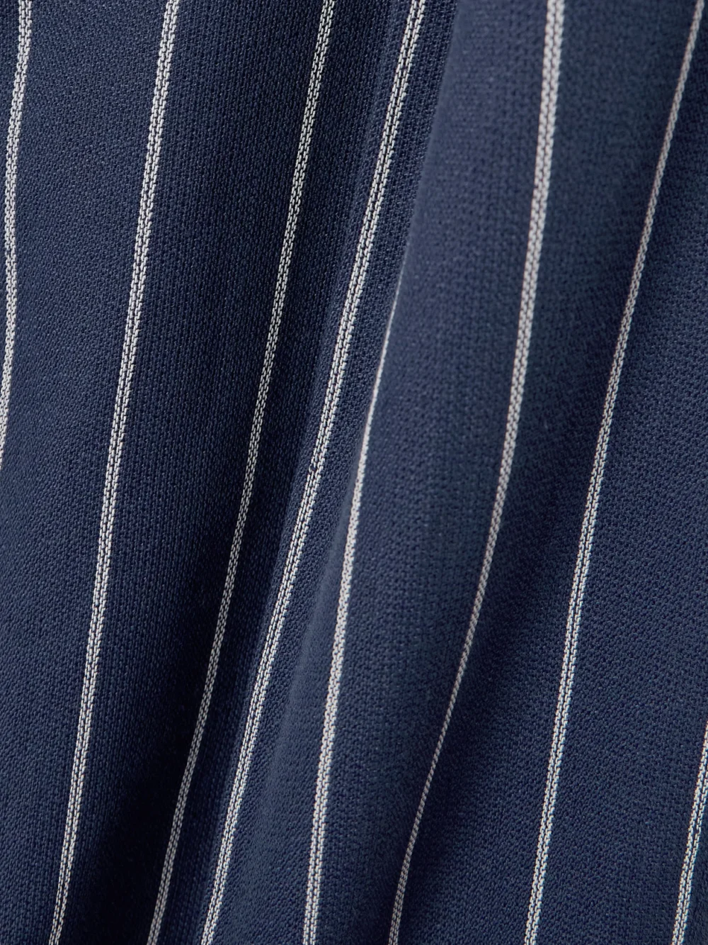 Close-up detail of the Ralph Lauren Collection Stamford Belted Pleated Pinstriped Linen and Cotton-blend Straight-leg Pants