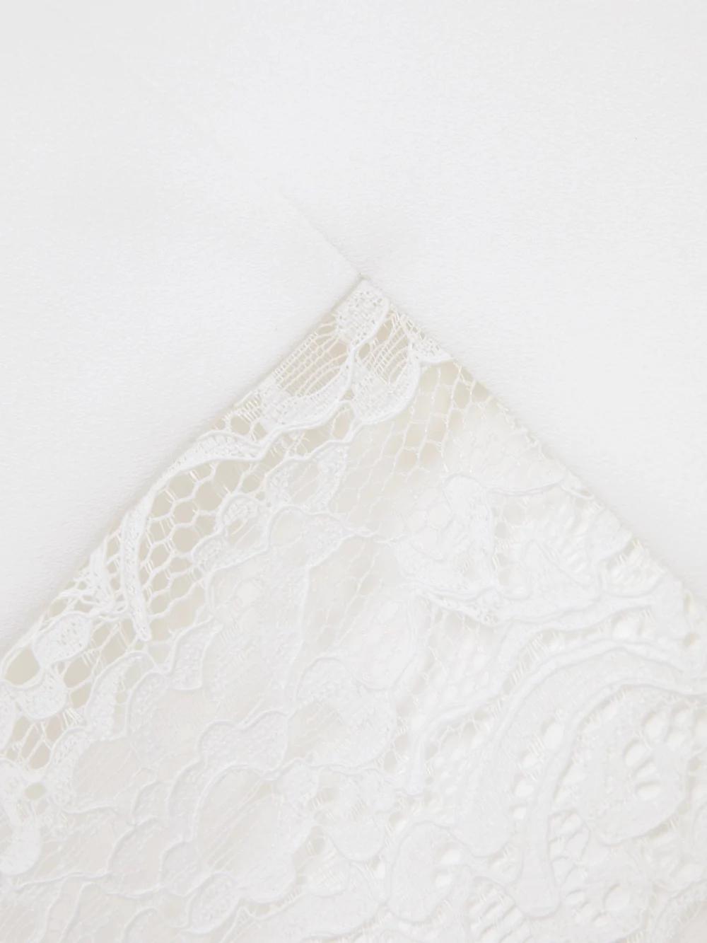 Close-up detail of the Rasario Asymmetric One-sleeve Lace-paneled Crepe Midi Dress