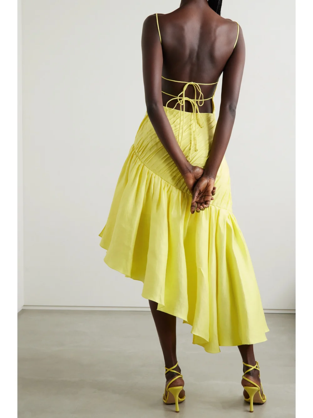 Back view of the Rasario Asymmetric Ruffled Linen-blend Dress