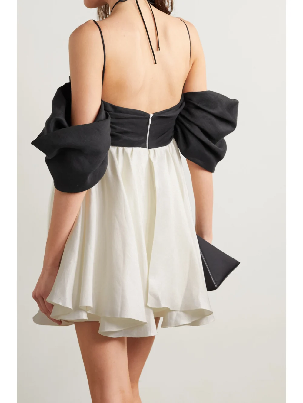 Back view of the Rasario Crystal-embellished Ruched Two-tone Linen-blend Halterneck Mini Dress