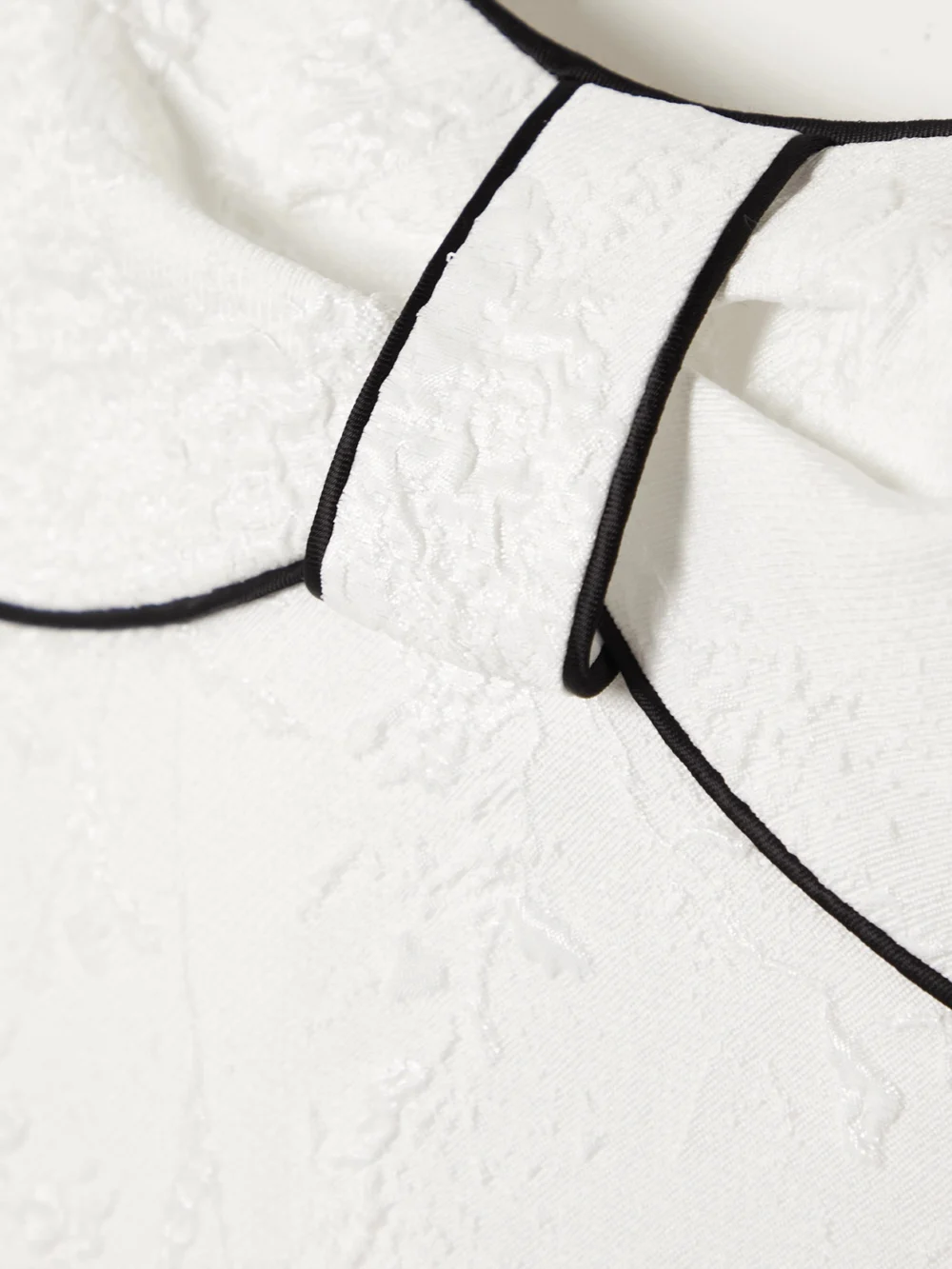 Close-up detail of the Rasario Piped Metallic Floral-jacquard Maxi Dress