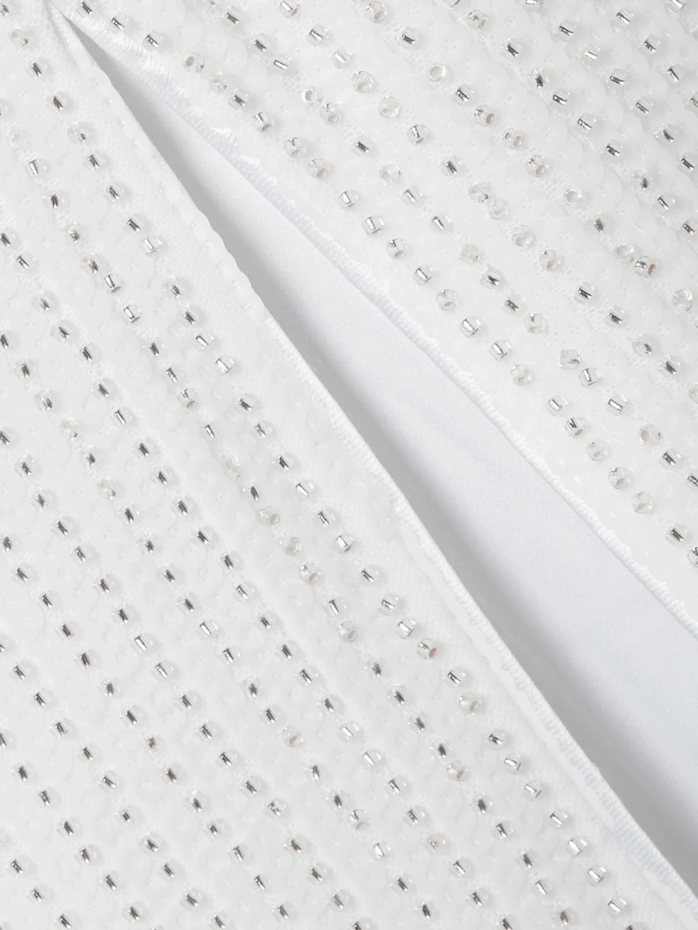 Close-up detail of the Rasario Sequin-embellished Tulle Gown
