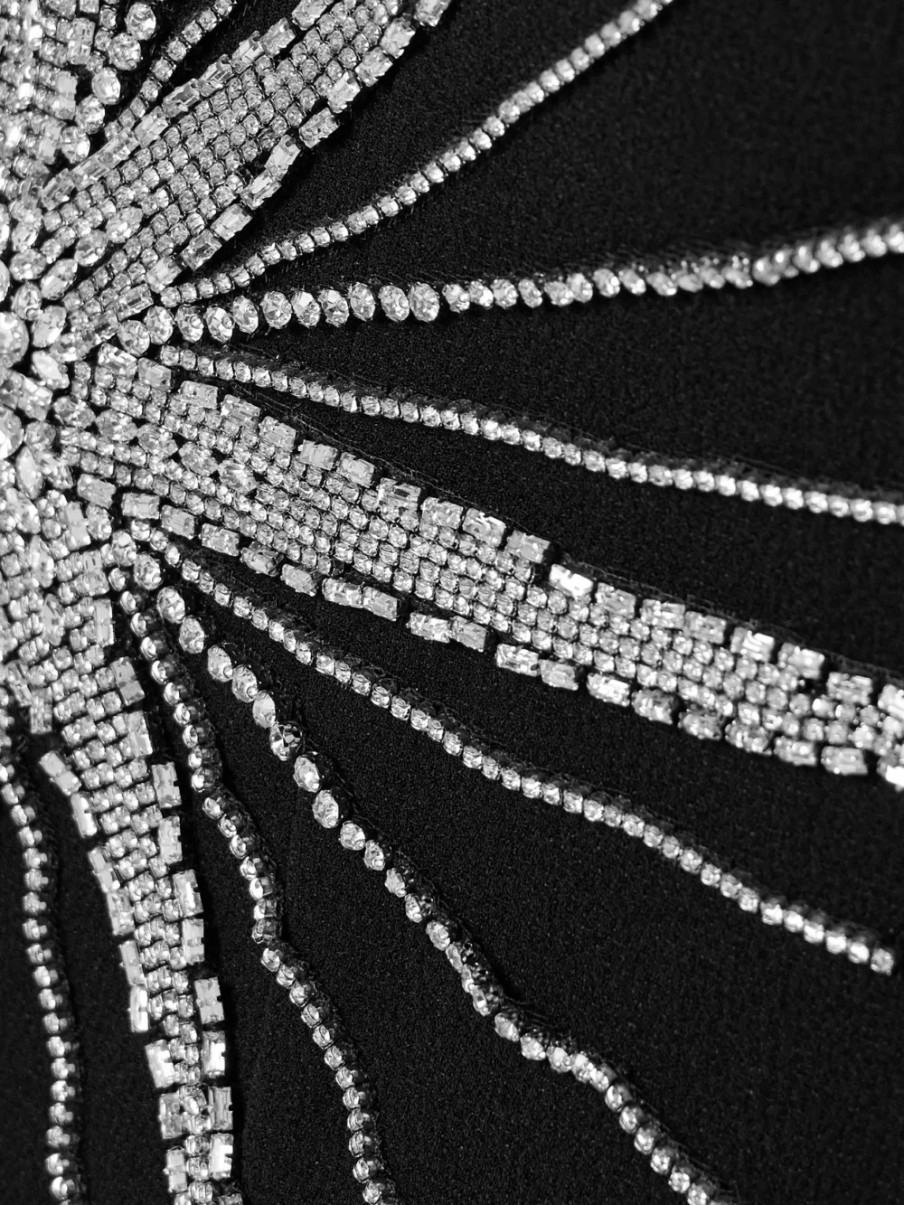Close-up detail of the Rebecca Vallance Estella Strapless Crystal-embellished Crepe Mini Dress