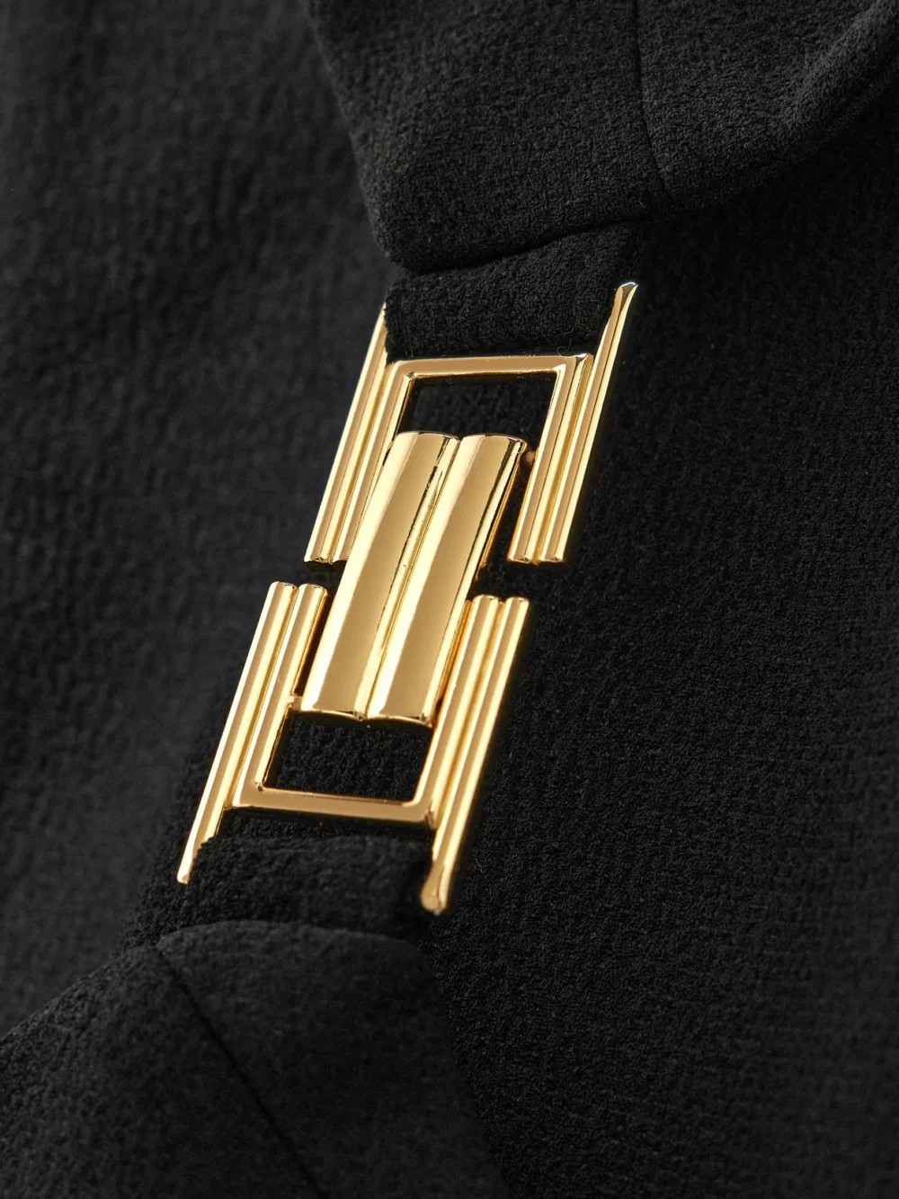 Close-up detail of the Rebecca Vallance Freyja Cutout Embellished Crepe Mini Dress