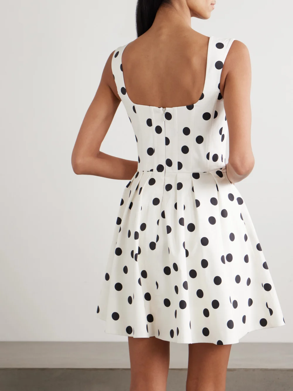 Back view of the Rebecca Vallance Maisie Pleated Polka-dot Cotton-blend Poplin Mini Dress