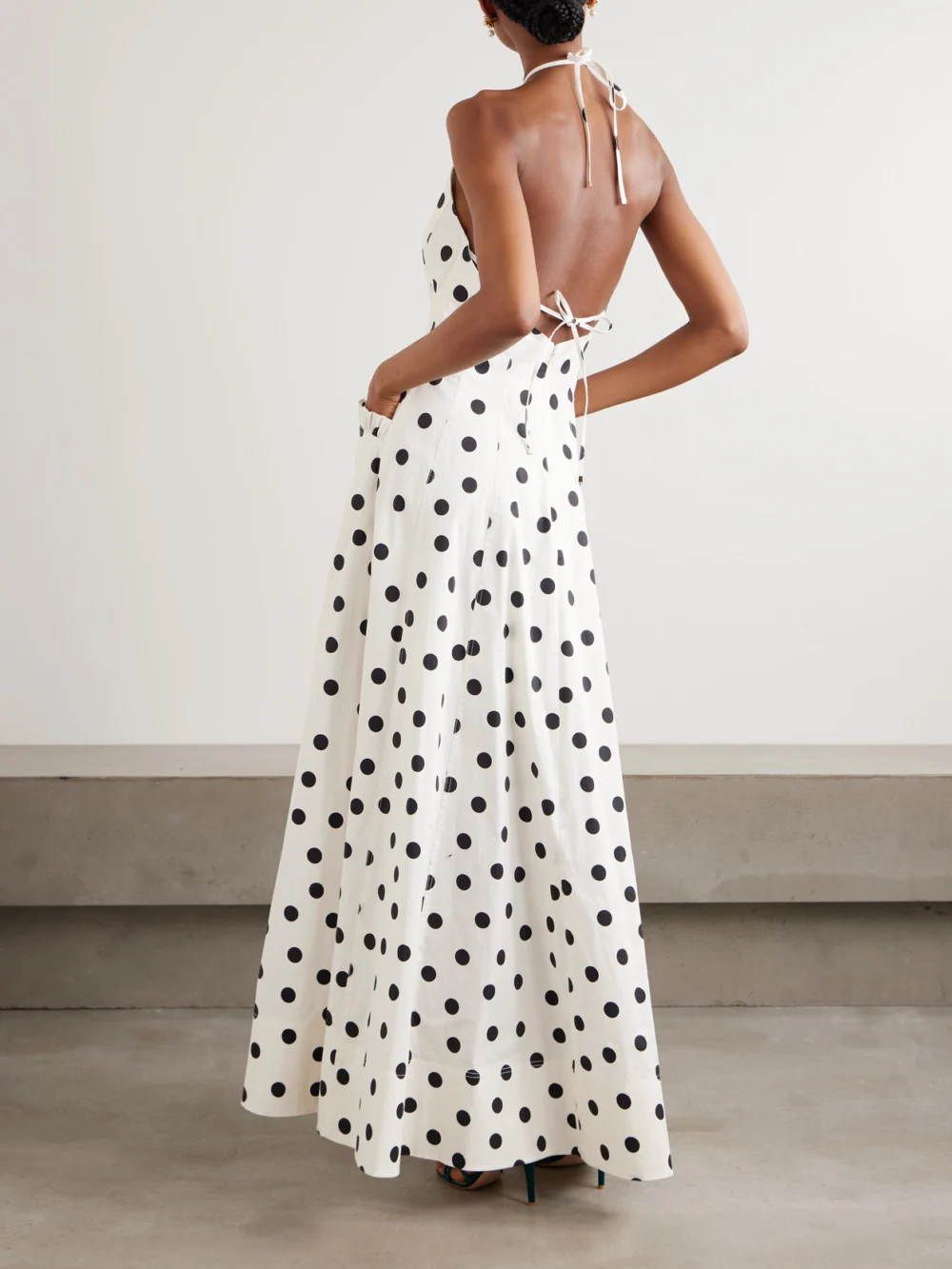 Back view of the Rebecca Vallance Maisie Ruffled Polka-dot Cotton-blend Poplin Halterneck Maxi Dress
