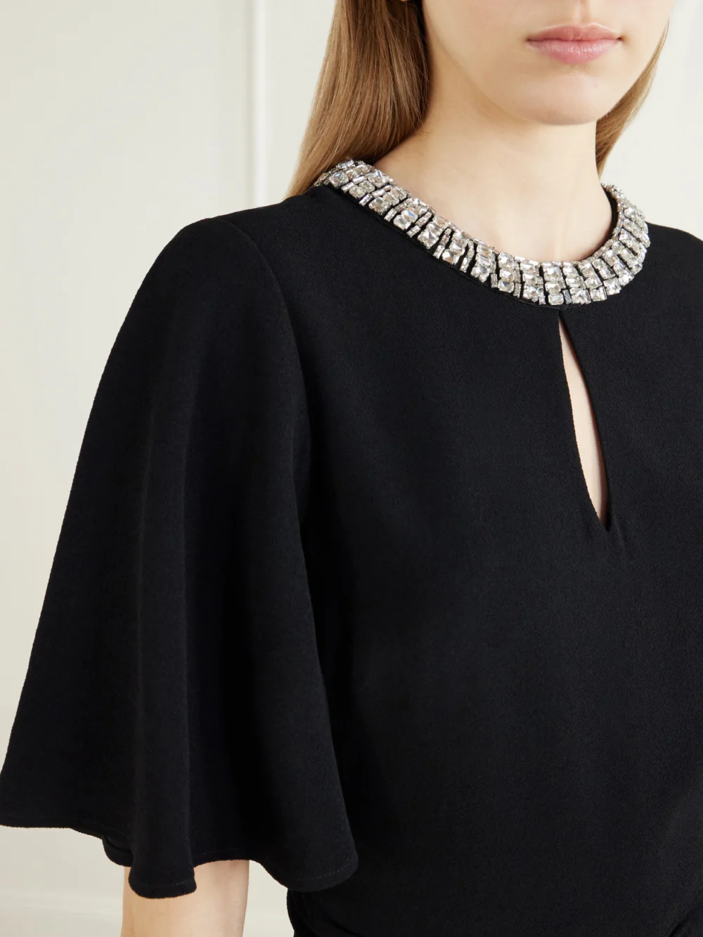 Close-up detail of the Rebecca Vallance Noemie Crystal-embellished Draped Crepe Midi Dress