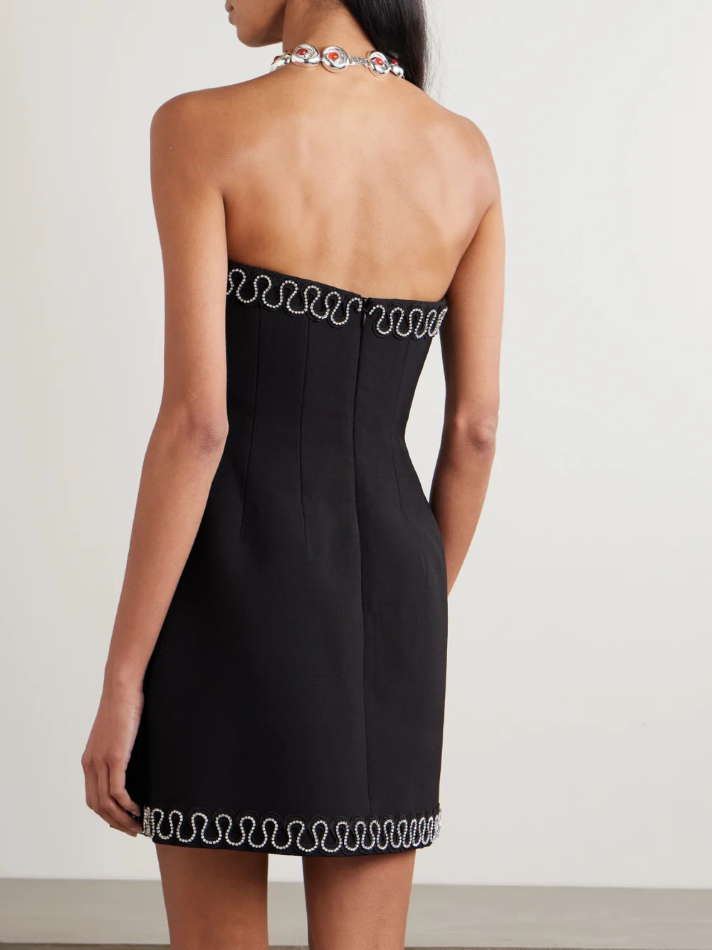 Back view of the Rebecca Vallance Nyx Strapless Crystal-embellished Crepe Mini Dress