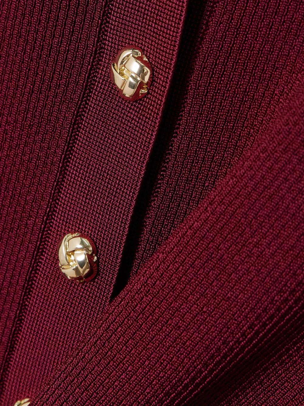 Close-up detail of the Rebecca Vallance Reagan Ribbed Jersey Midi Dress
