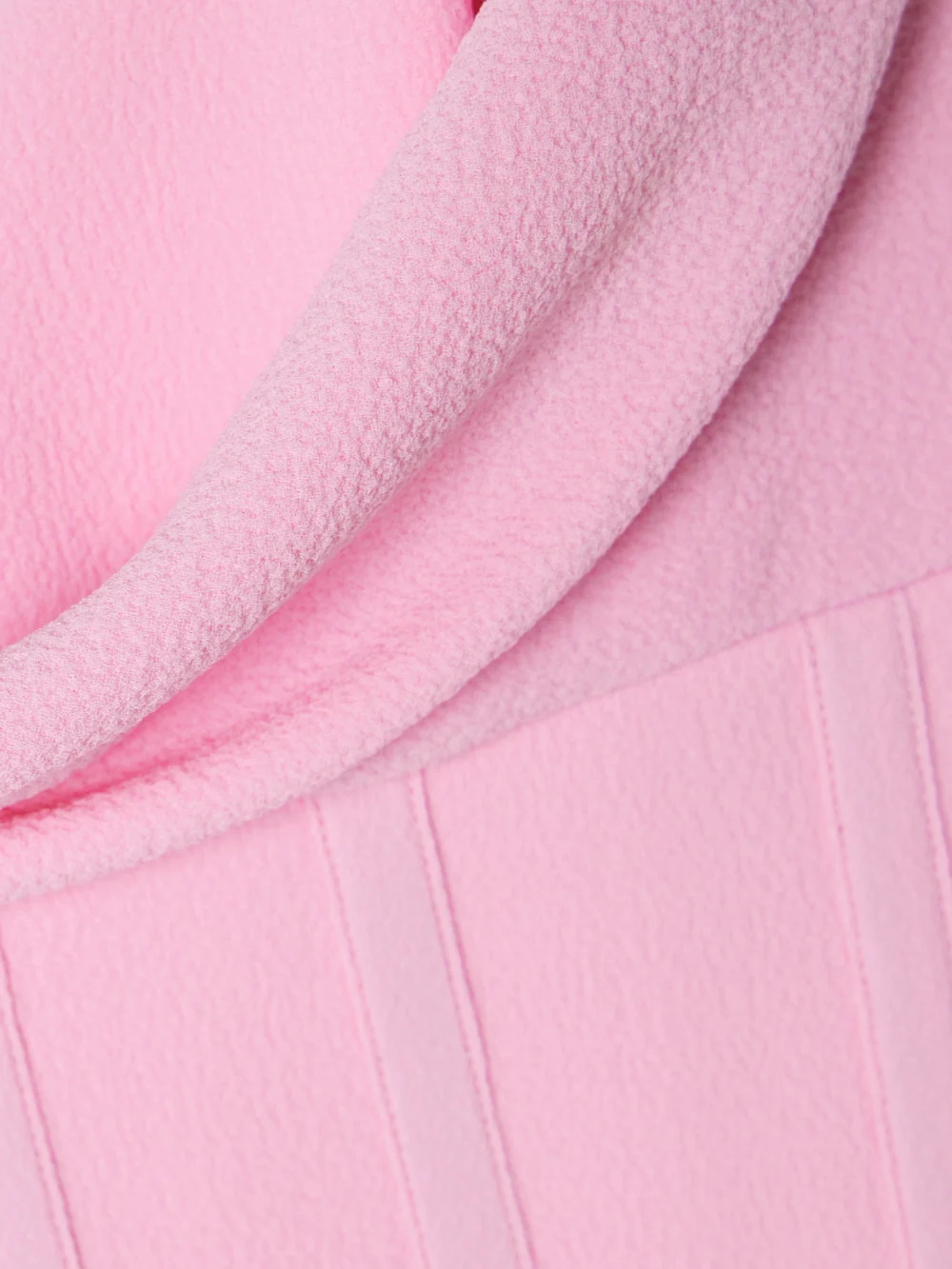 Close-up detail of the Rebecca Vallance Skyla Strapless Draped Crepe Gown