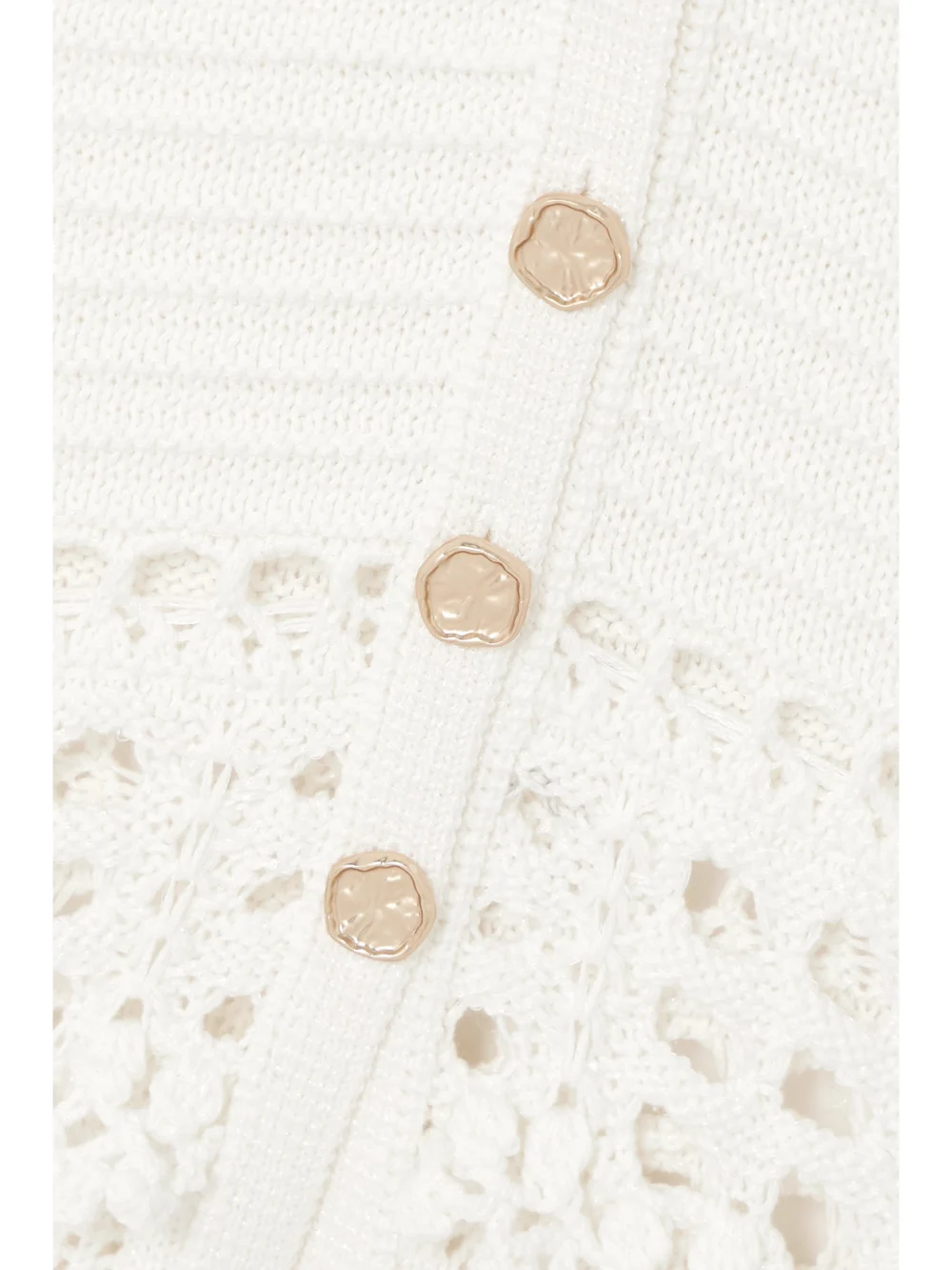 Close-up detail of the Retrofête Alaia Iridescent Crochet-knit Cardigan