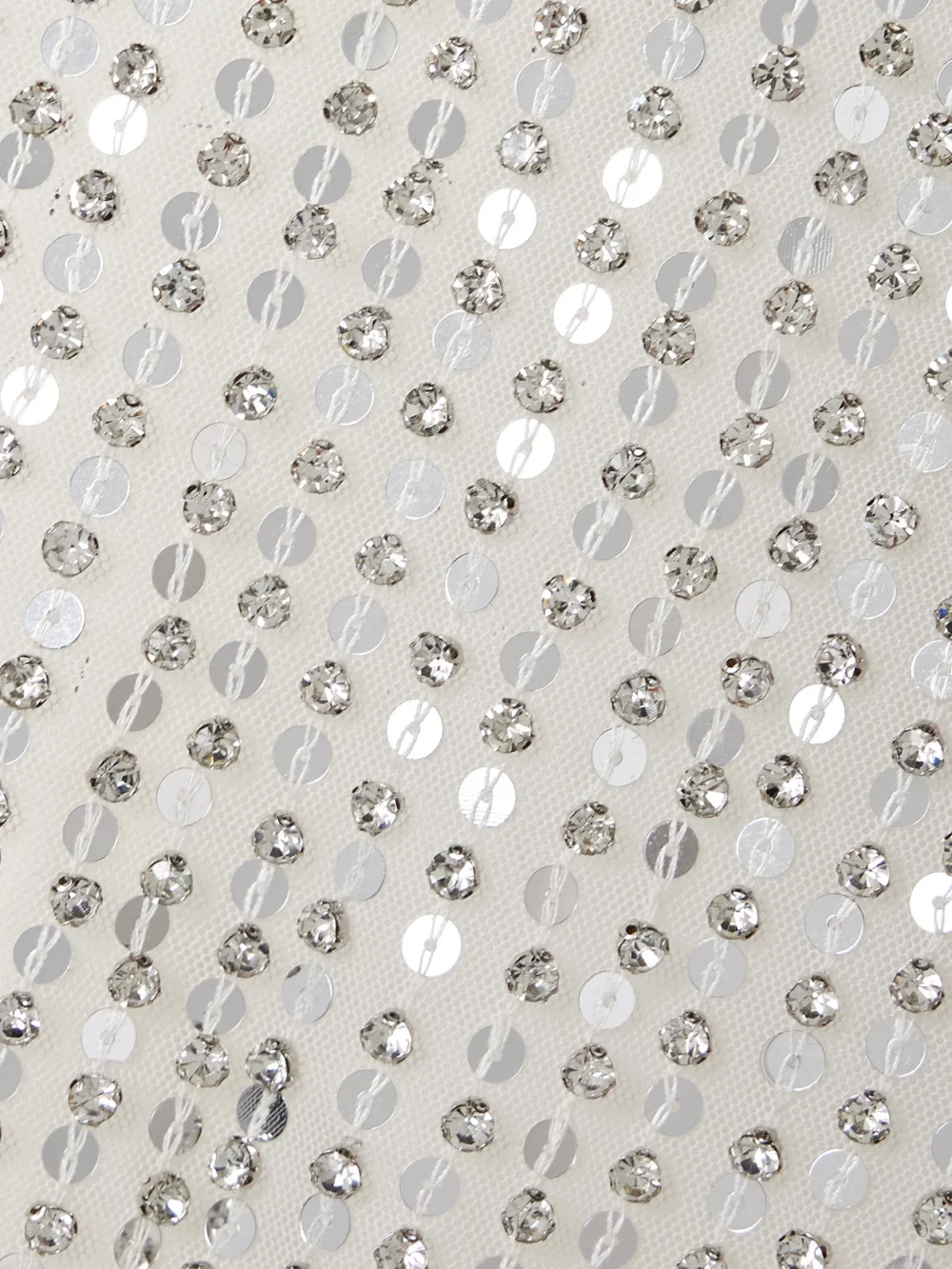 Close-up detail of the Retrofête Danae Draped Embellished Tulle Mini Dress