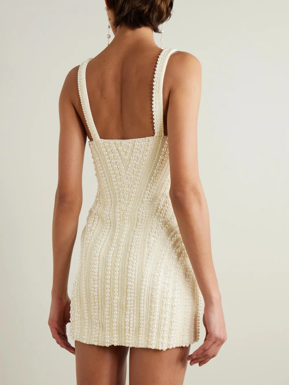 Back view of the Retrofête Elaina Faux Pearl-embellished Crepe Mini Dress