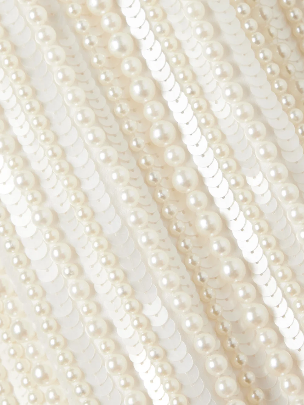 Close-up detail of the Retrofête Yaeko Embellished Crepe Halterneck Mini Dress