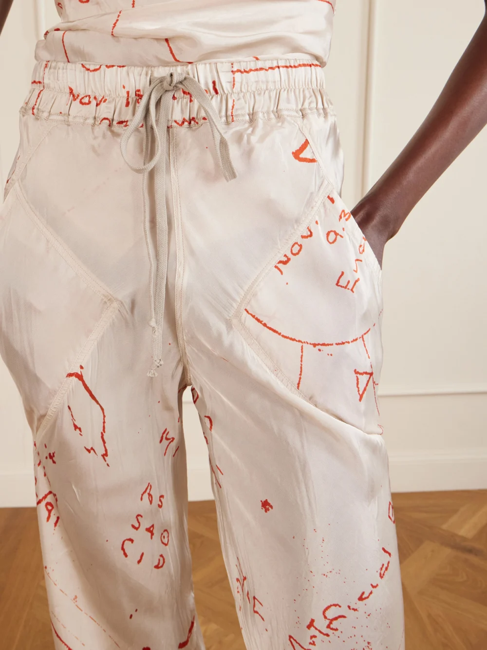 Close-up detail of the Rick Owens Bias Paneled Printed Satin Pants