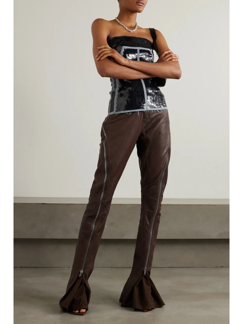 Rick Owens Bolan Banana Cotton-paneled Leather Flared Pants, worn by a model