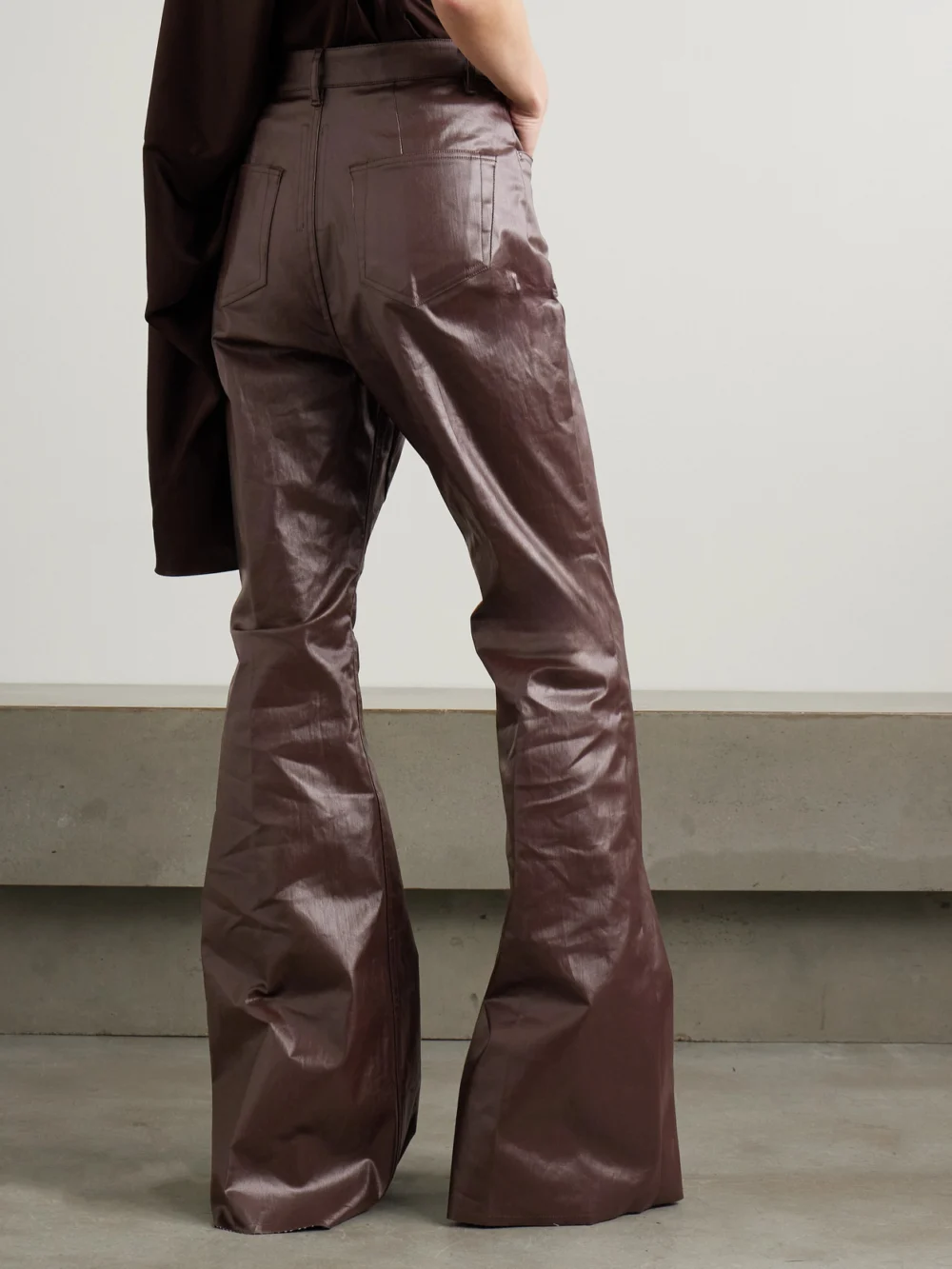 Back view of the Rick Owens Bolan Coated High-rise Flared Jeans