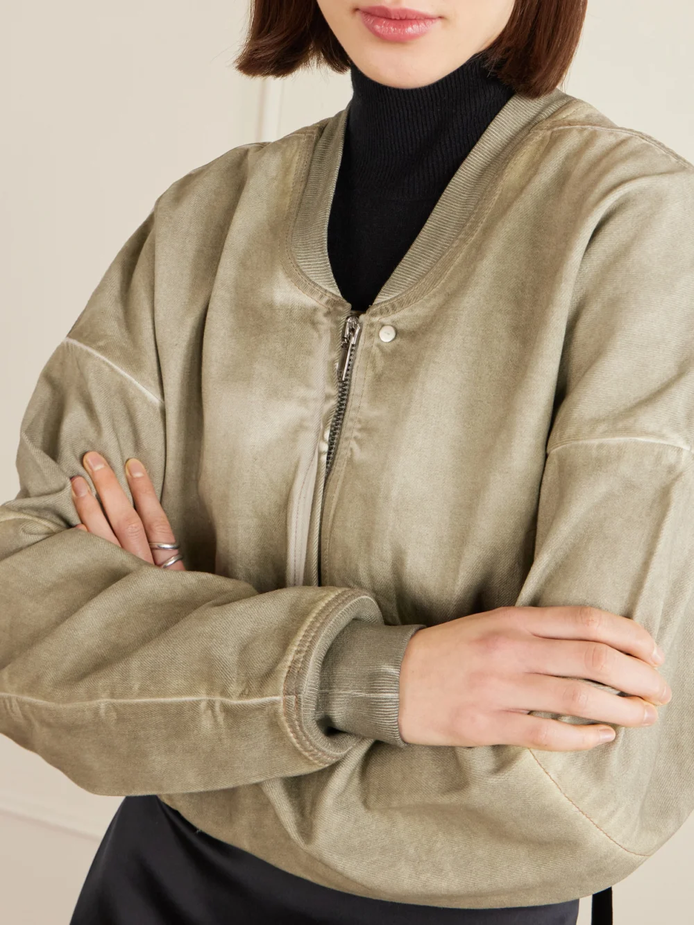 Close-up detail of the Rick Owens Cropped Distressed Denim Jacket