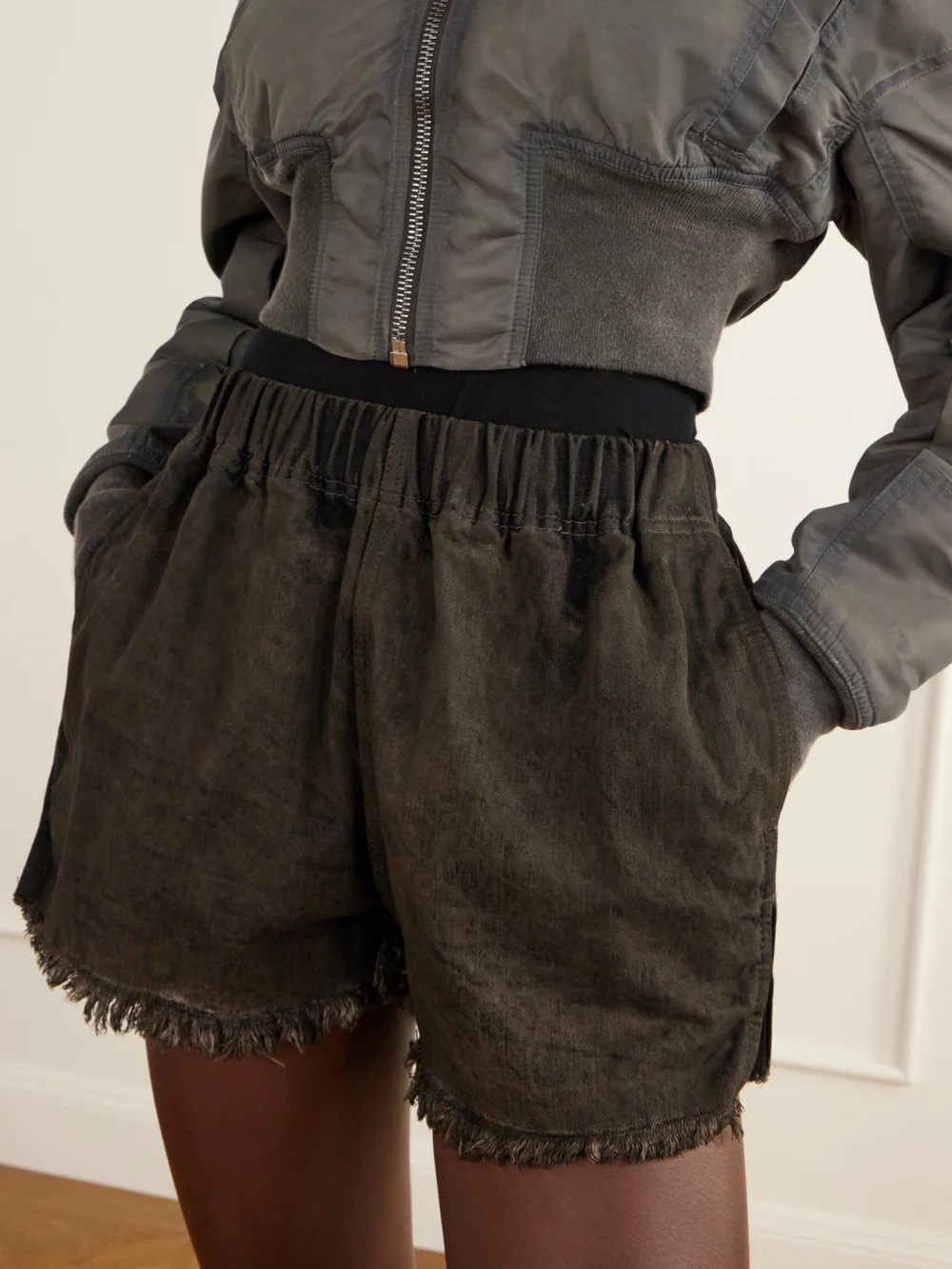 Close-up detail of the Rick Owens Frayed Denim Shorts
