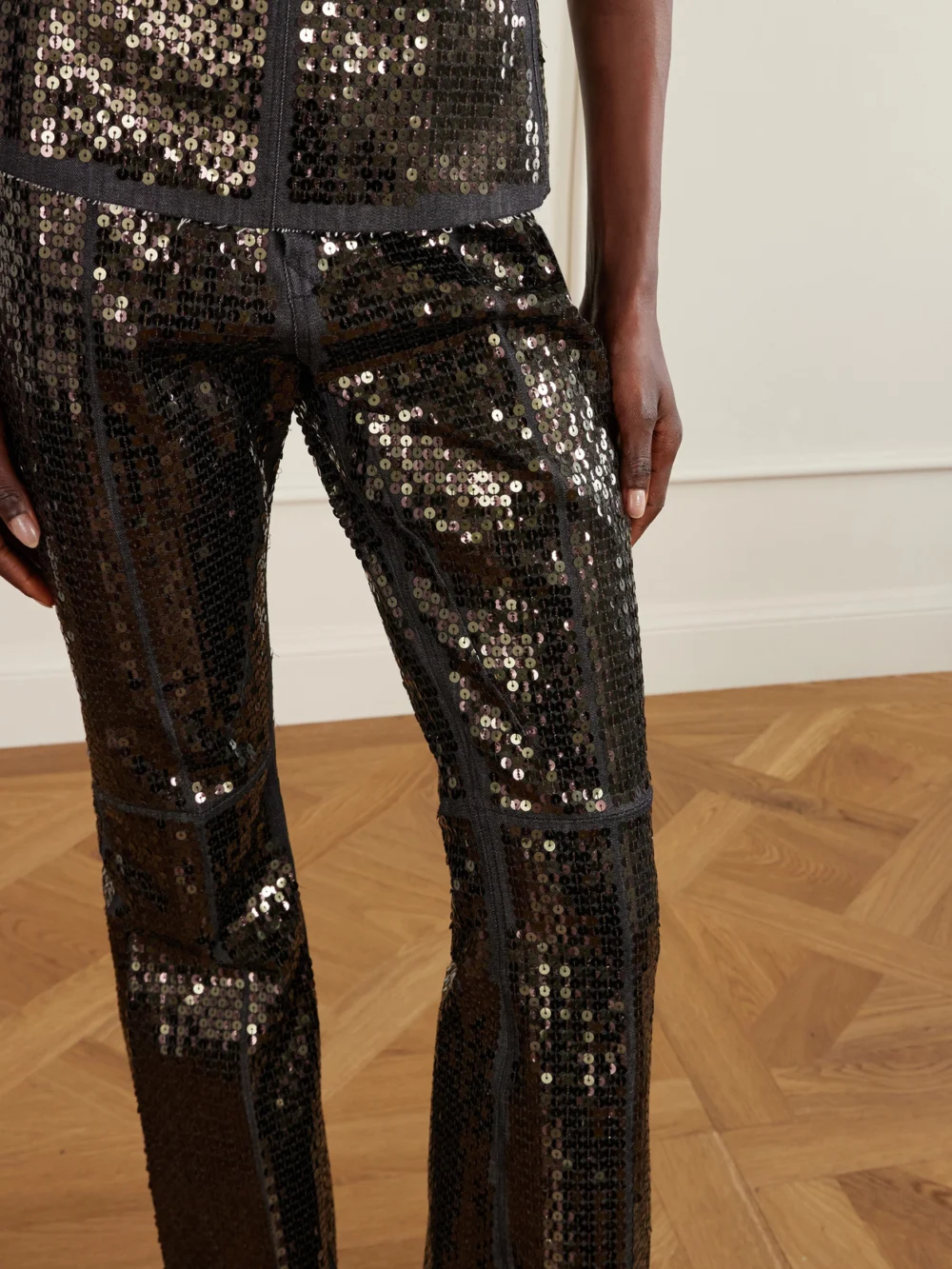 Close-up detail of the Rick Owens Sequined High-rise Bootcut Jeans