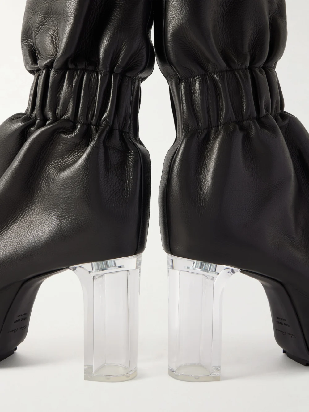 Close-up detail of the Rick Owens Taquito Gathered Leather Ankle Boots