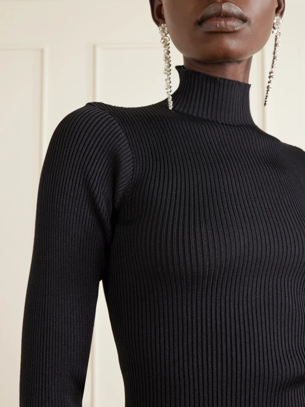 Close-up detail of the Rier Ribbed Silk Turtleneck Sweater